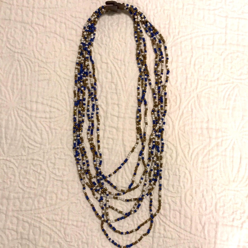 Blue, gold, and white beaded necklace